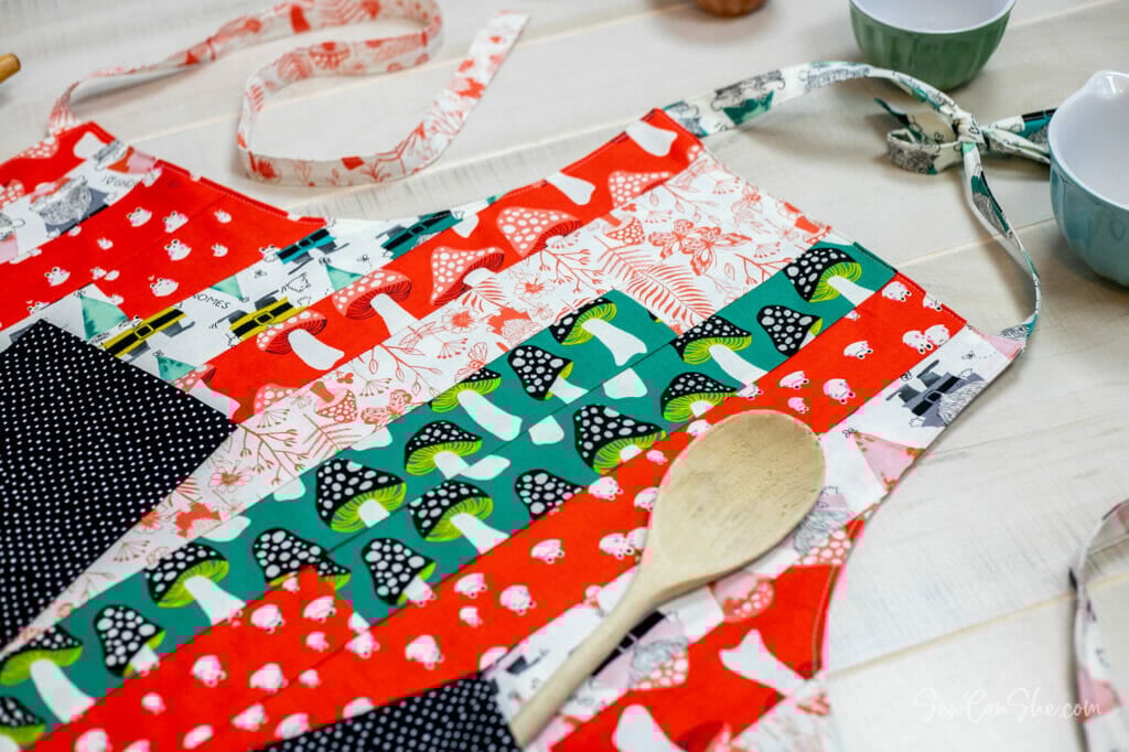 red and green fabric handmade apron