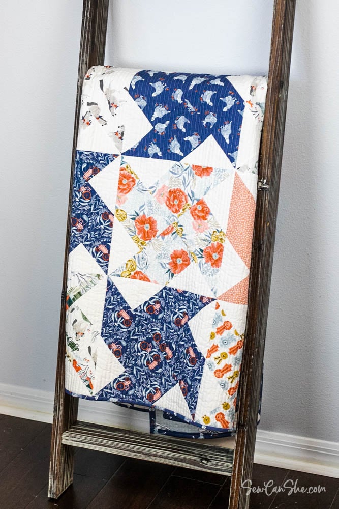 https://sewcanshe.com/fat-quarter-whirlwind-quilt-free-pattern/ 66x55 throw