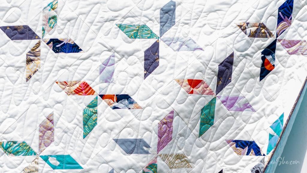 Colorful quilt with half square triangles