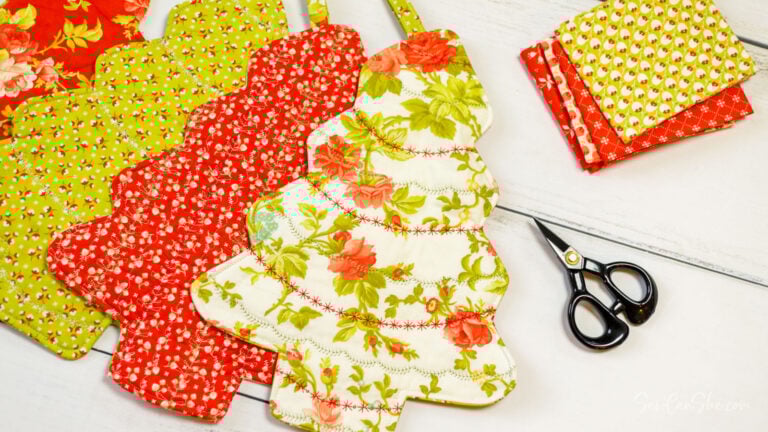 Christmas tree pot holders sewn with colorful fabric