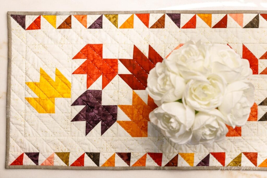 table runner with flowers