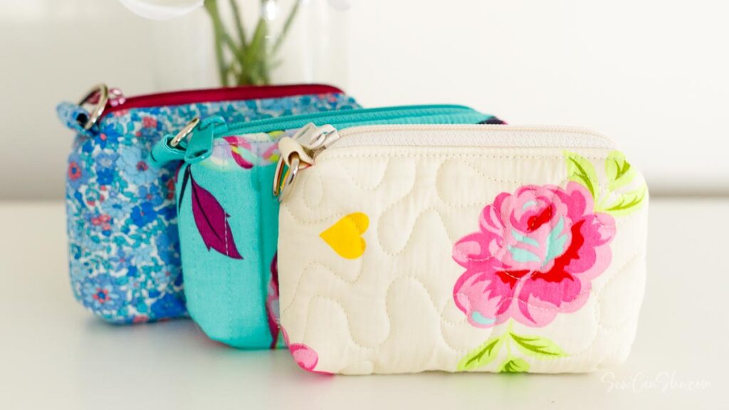 Colorful fabric pouches in a row