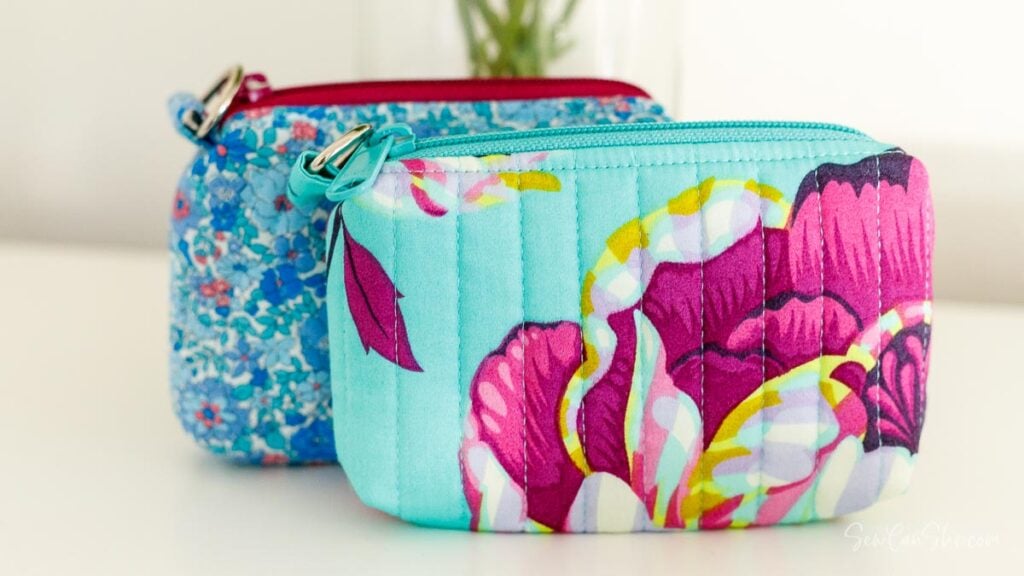 Colorful floral zippered pouches displayed