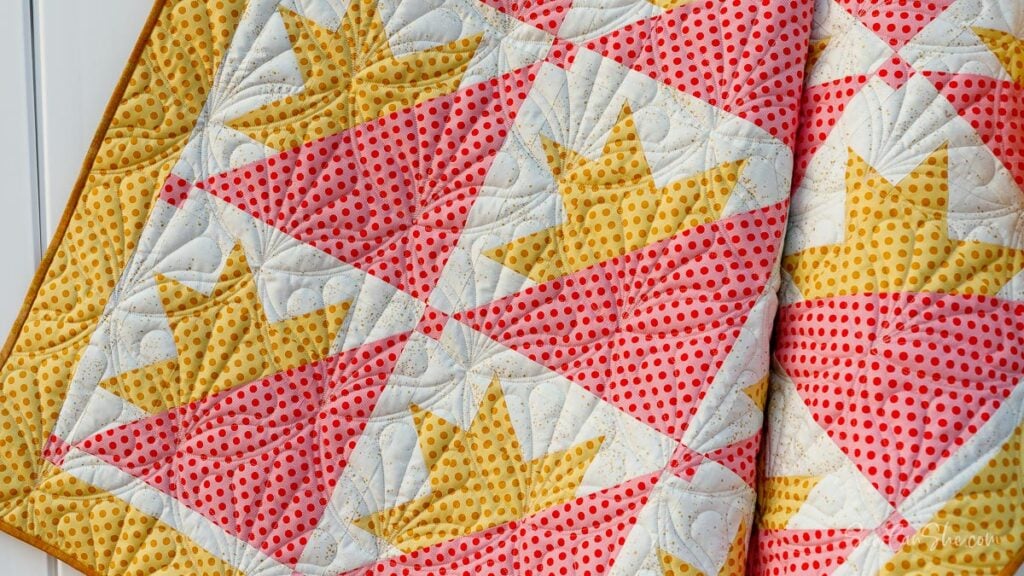 Colorful quilt with half star quilt blocks
