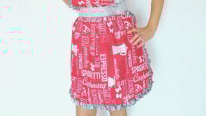 Red apron with food-themed prints