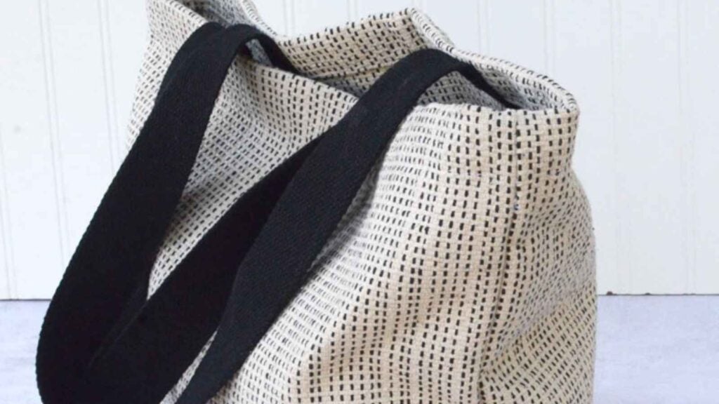 Sturdy tote with handles sewn from a rug