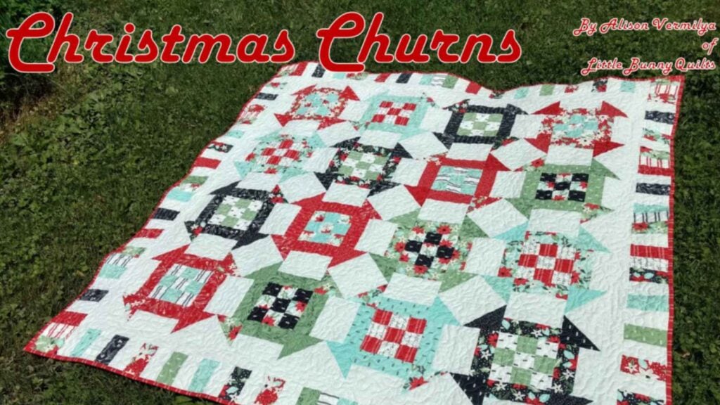 Churn dash quilt block sewn with Christmas colors