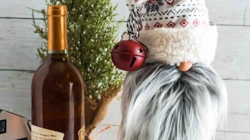 Wine bottle and a gnome wine bottle topper