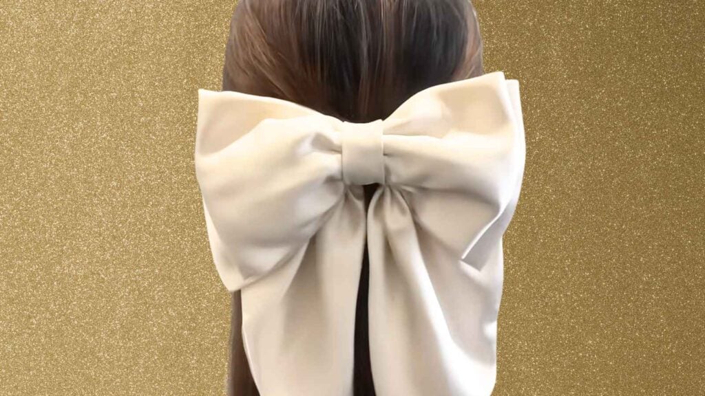 giant DIY hair bow on a model