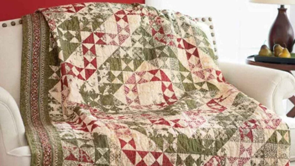 Red, green, and white Christmas quilt sewn with split star blocks