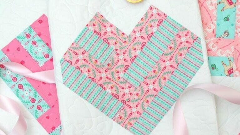Colorful heart-patterned quilt with embellishments