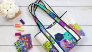Colorful quilted bag pattern with accessories