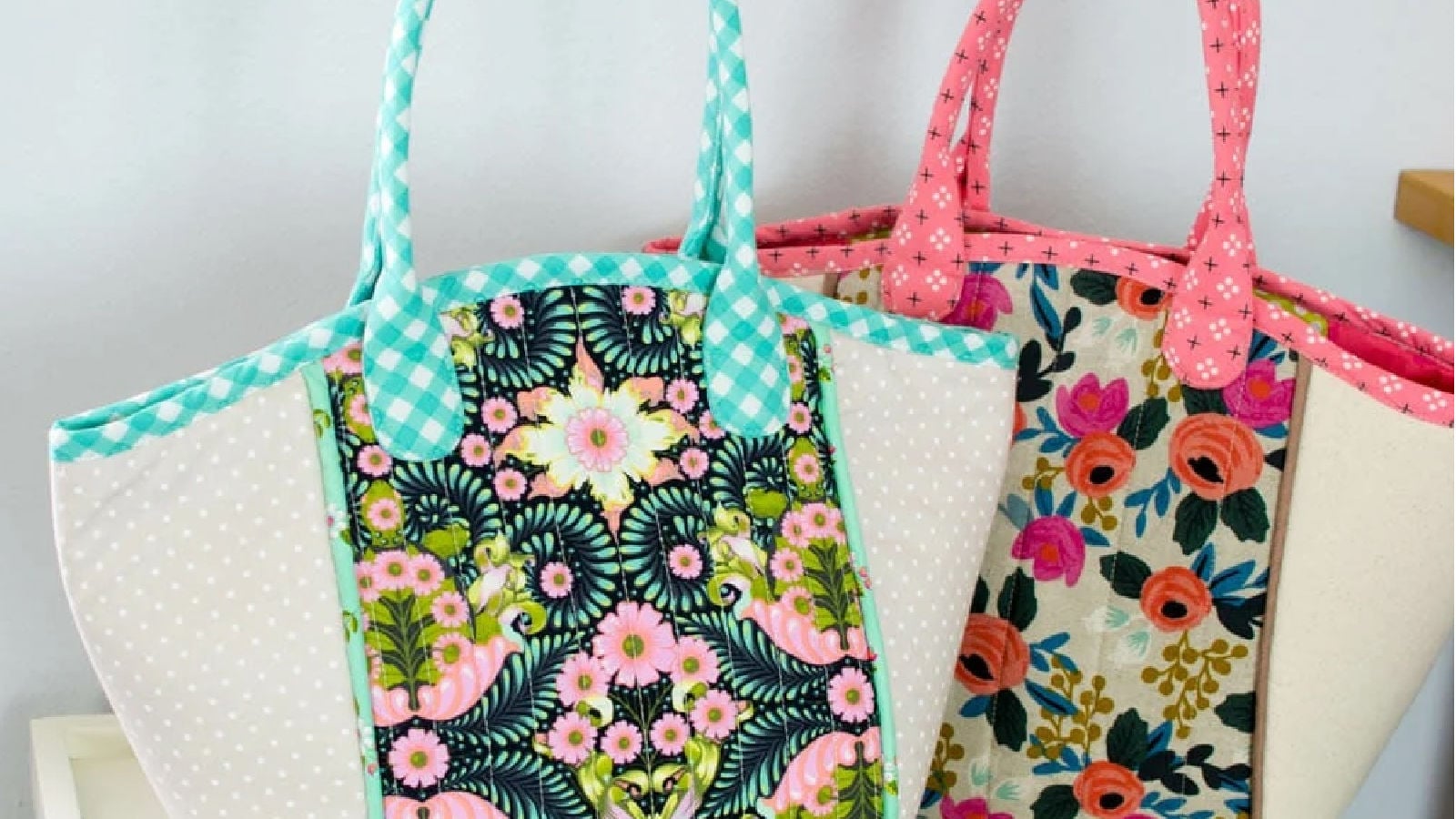 Colorful floral tote bags displayed together