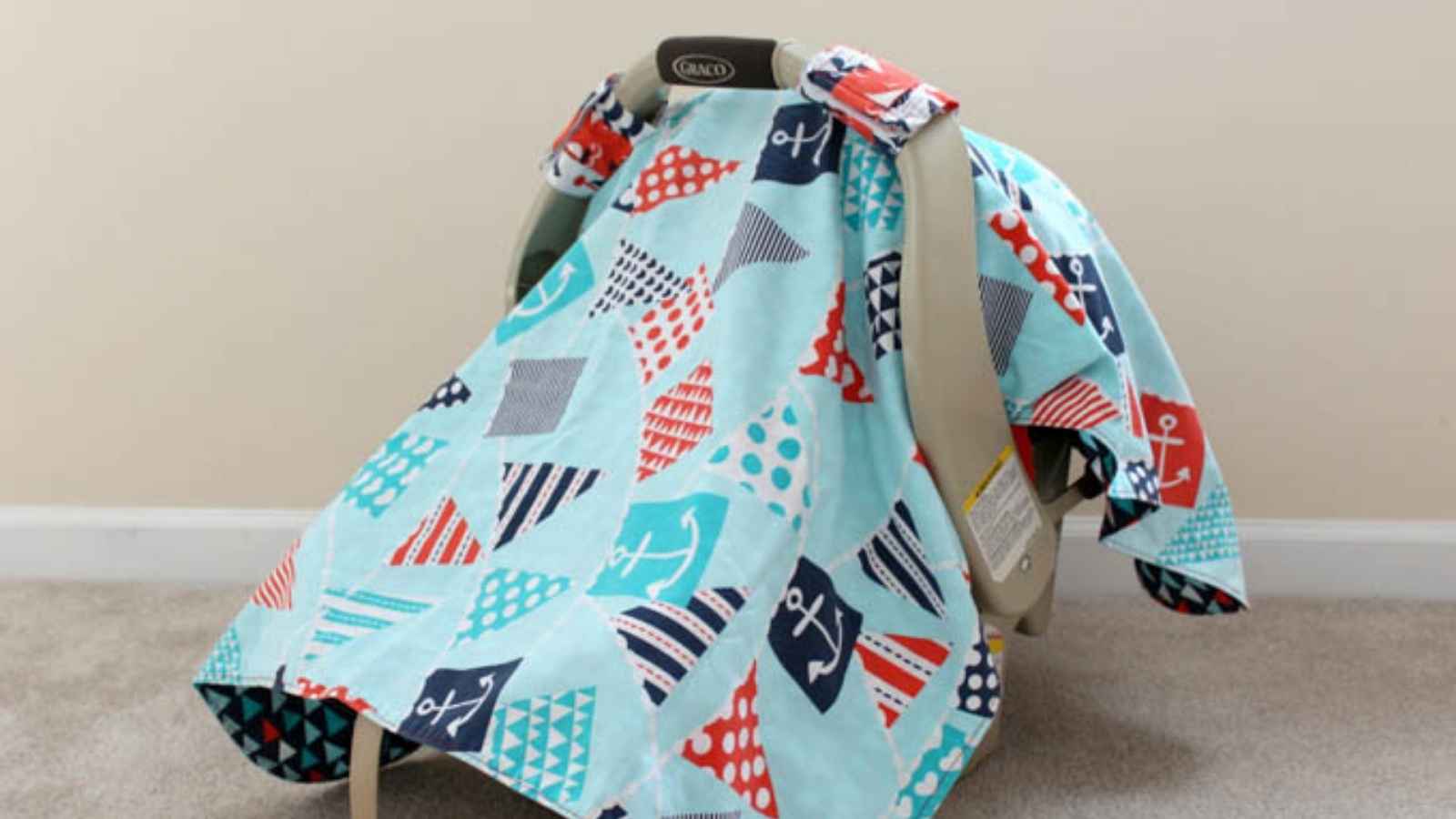 handsewn car seat cover for a newborn