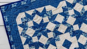 blue, white, and floral carpenters star quilt pattern