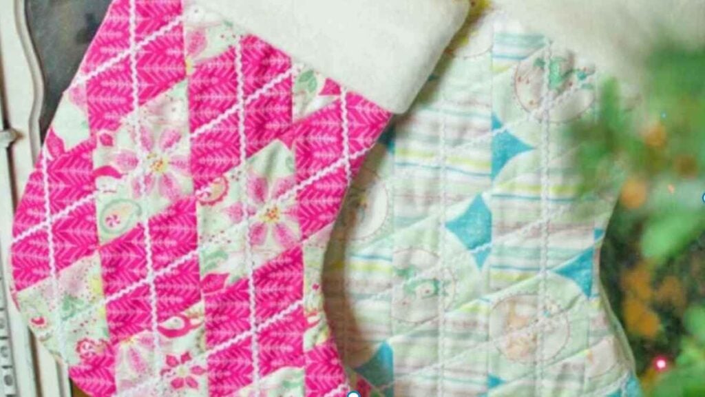 Colorful quilted Christmas stockings hanging