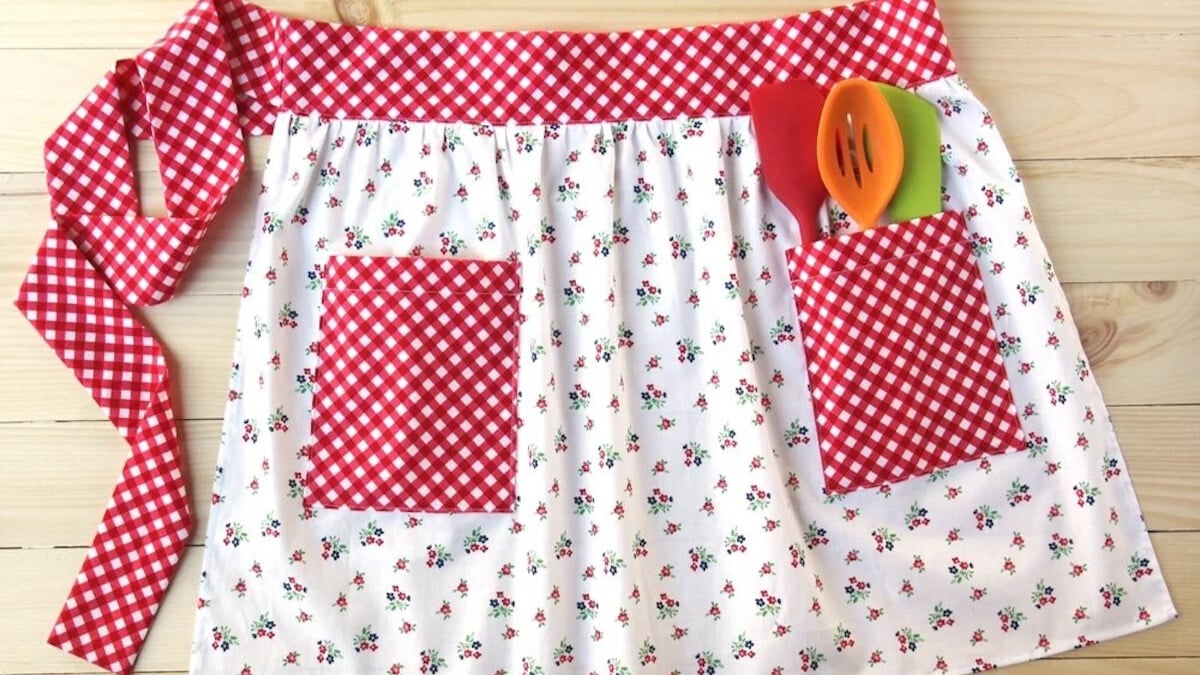 Red checkered apron with floral design