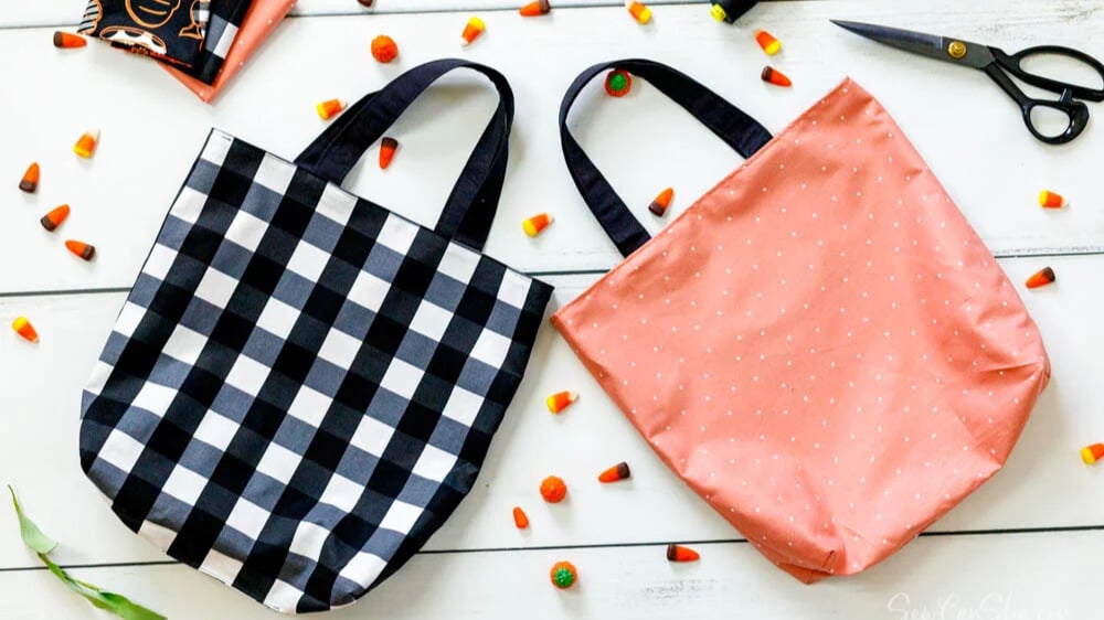 Two colorful tote bags on table