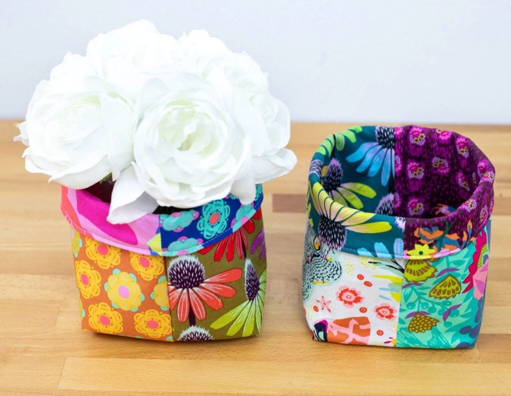 Colorful fabric baskets with flowers