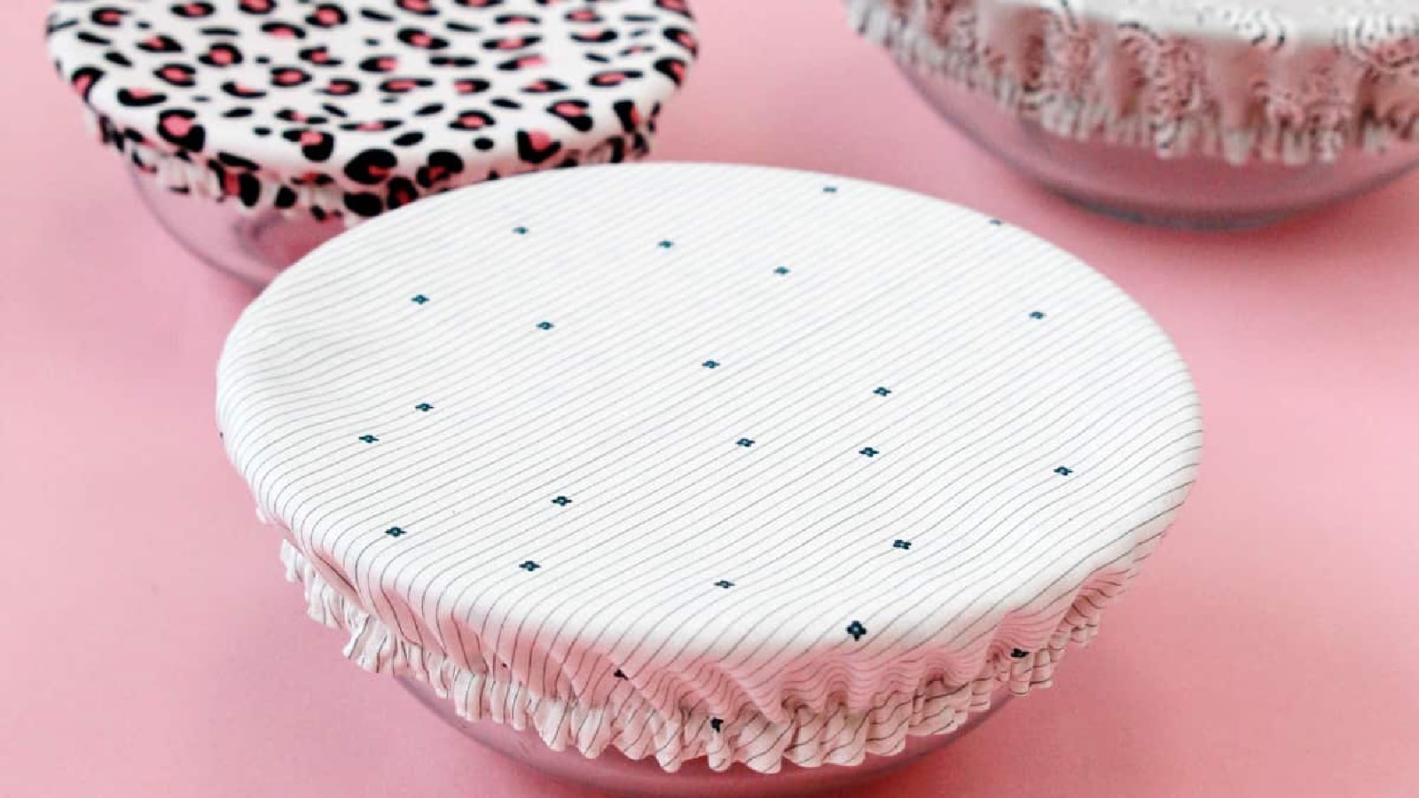Colorful fabric covers on glass bowls