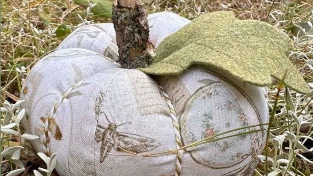 Decorative fabric pumpkin with leaf