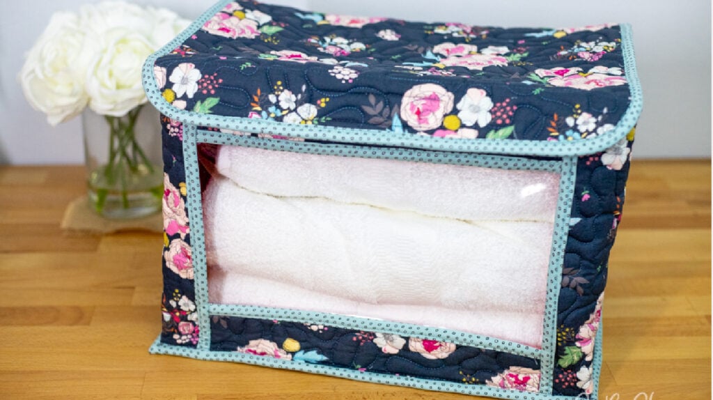 Sturdy quilted trunk organizer with a lid for extra security. Keep emergency blankets clean, or store your reusable shopping bags.