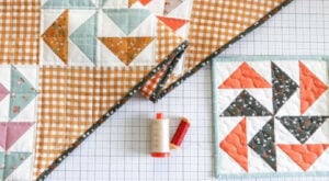 Colorful quilted table runner and squares