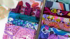 fat quarter bundle fabric spread out to show all prints