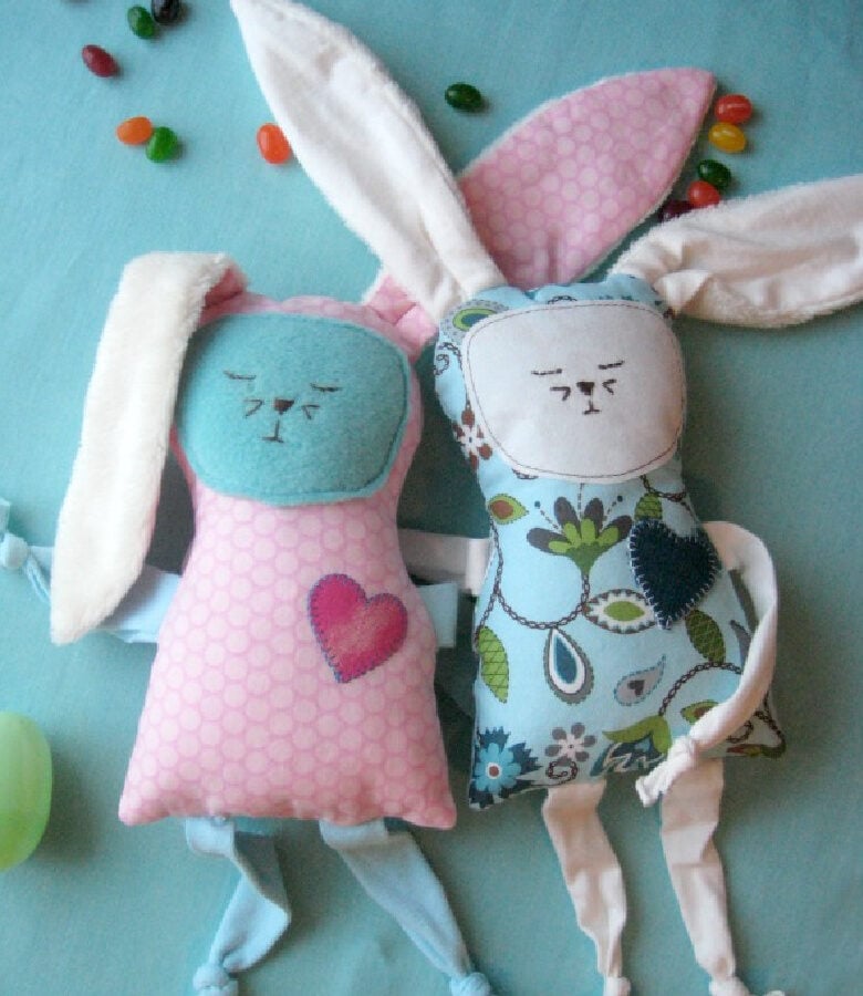 A colorful scrap-busting stuffed bunny plushie with long floppy ears, perfect for a sustainable DIY sewing project.