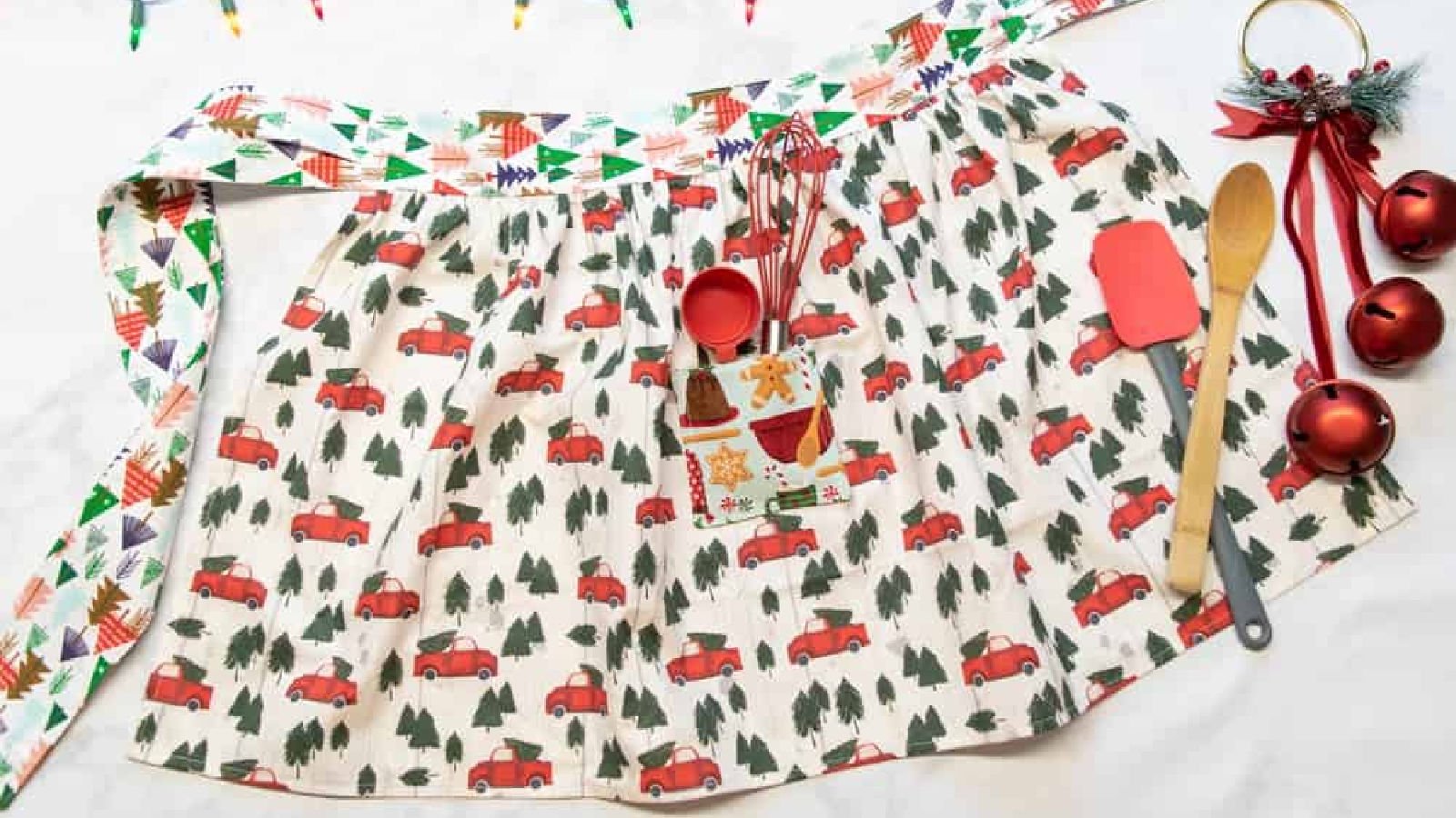 Red truck pattern on festive apron