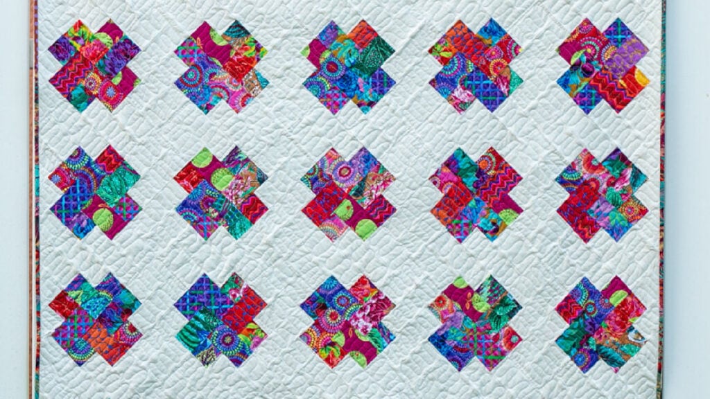 colorful quilt with scrappy fabrics
