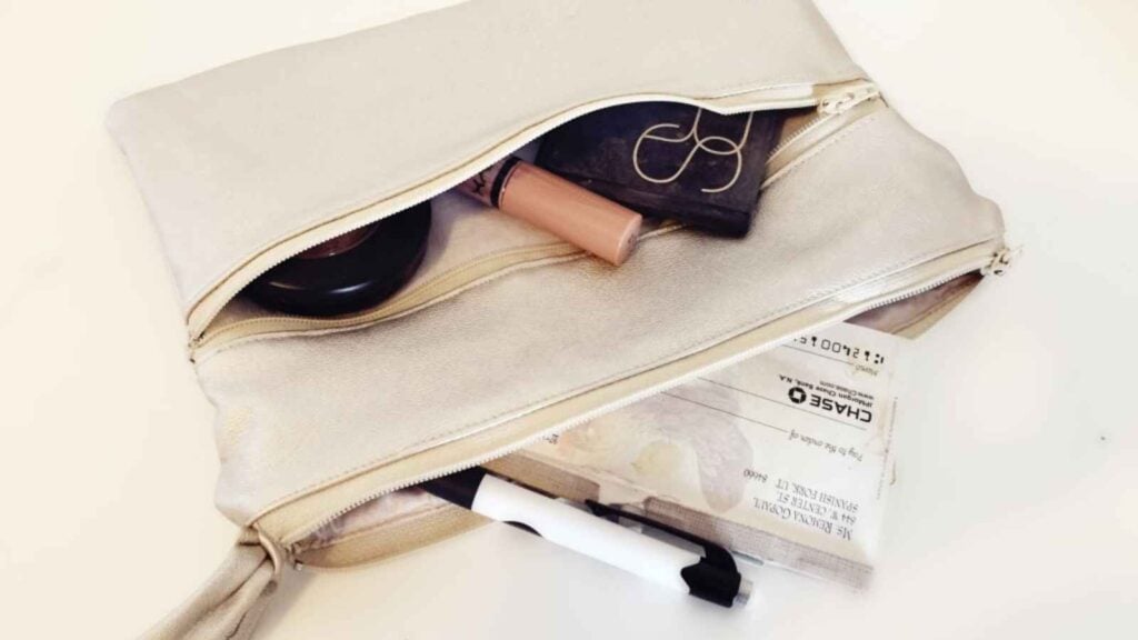 Cosmetic bag with various items inside