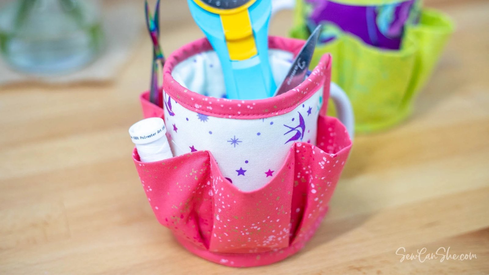 Pretty mug caddy made from fabric.