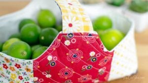 Colorful Easter basket filled with limes.