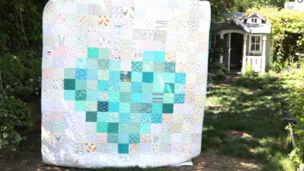 turquoise patchwork heart on a valentine quilt