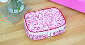 Floral-patterned zippered storage pouch