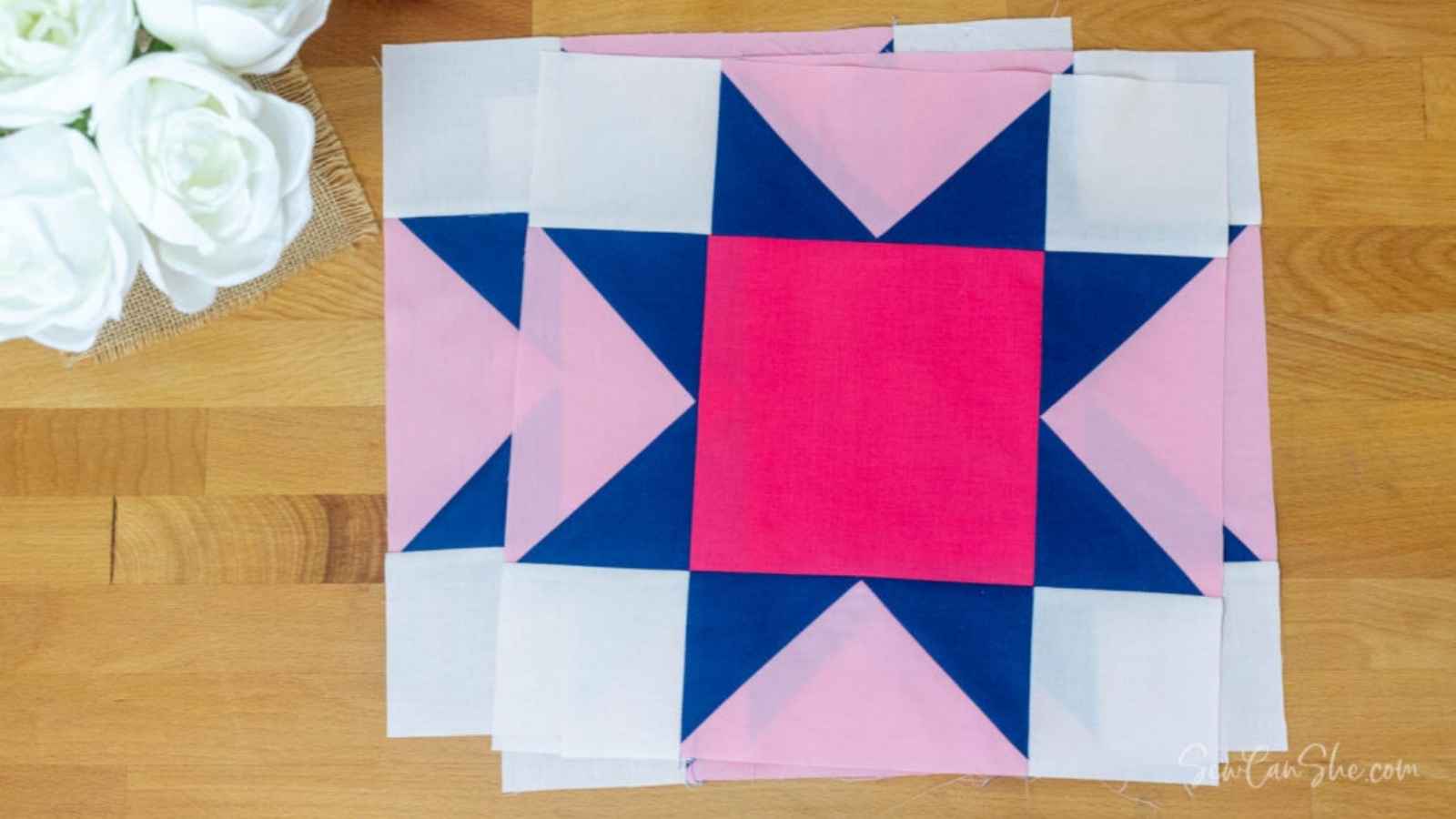 pile of variable star quilt blocks sewn using the flying geese unit